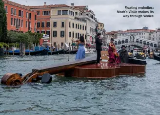  ?? ?? Floating melodies: Noah’s Violin makes its way through Venice