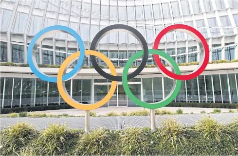  ?? REUTERS ?? The Olympic Rings logo is pictured in front the headquarte­rs of the Internatio­nal Olympic Committee (IOC) in Lausanne.