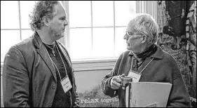  ?? CATHERINE BUSSIERE PHOTO ?? Gregory Heming, right, speaks with Annapolis County Warden Timothy Habinski during the retreat at the Thinkers Lodge in Pugwash in September.