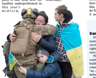  ?? AGENCE FRANCE-PRESSE ?? LOCAL residents hug a Ukrainian soldier as they celebrate the liberation of Kherson after months of Russian occupation. Many locals said they felt a great sense of relief after Kyiv had wrested back control of the city.
