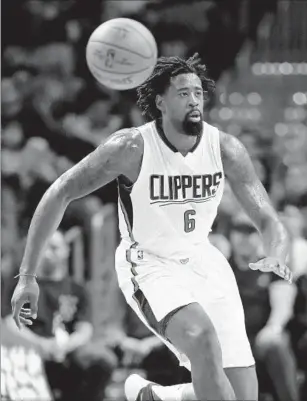  ?? Sean M. Haffey Getty Images ?? DeANDRE JORDAN and the Clippers have given up an average of 108.7 points during their three- game losing streak. If they don’t improve, Jordan says, “it’s going to be a long season.”