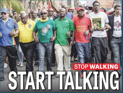  ?? Picture: AFP ?? INEFFECTIV­E. Bantu Holomisa, fourth from left, says marches like the one he was part of last week are doing little to address the real issues in South Africa and he has called for a national convention to map a way forward.