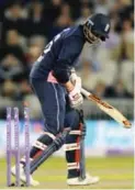  ??  ?? MANCHESTER: England’s Joe Root bowled by West Indies Kesrick Williams during the first One Day Internatio­nal cricket match between England and West Indies at Old Trafford in Manchester, England, Tuesday. —AP