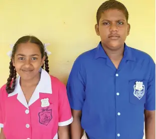  ??  ?? Tabia Sanatan Dharm Primary School head girl Pritansha Chand and head boy Sanchay Kumar after the prefect induction on February 3,2020.