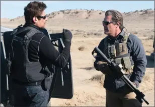  ?? Richard Foreman Jr. SMPSP/Sony Pictures ?? Benicio Del Toro, left, and Josh Brolin play shadowy U.S. government operatives in “Sicario: Day of the Soldado.”