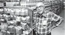  ?? PALACE OF THE GOVERNORS PHOTO ARCHIVES HP.2014.14.556 ?? Tito Griego in his store, Tito’s Market, on Acequia Madre and Garcia Street, Santa Fe, New Mexico, circa 1980.