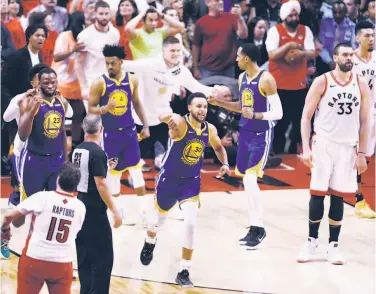  ?? Photos by Scott Strazzante / The Chronicle ?? Stephen Curry reacts as his team defeats the Raptors in Game 5 in Toronto to force a Game 6 in Oakland.