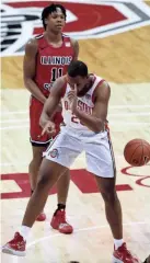  ?? JOSHUA A. BICKEL/COLUMBUS DISPATCH ?? Freshman forward Zed Key Jr. celebrates after being fouled while dunking during the first half of Ohio State's season-opening win over Illinois State.