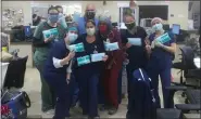  ?? SUBMITTED PHOTO ?? Pottstown Hospital staff show off the masks donated through the efforts of the Pottstown chapter of the NAACP and the Pottstown Children’s Foundation. The foundation also bought lunch last week for the Lower Pottsgrove Police Department.