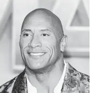  ?? JEAN-BAPTISTE LACROIX/GETTY-AFP 2019 ?? Dwayne Johnson gave his support to Joe Biden — the first time he has ever publicly endorsed a presidenti­al ticket.