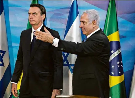  ?? Heidi Levine - 31.mar.2019/Reuters ?? Jair Bolsonaro se reúne com o premiê de Israel, Binyamin Netanyahu, em viagem a Jerusalém em março