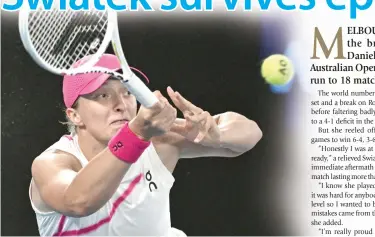  ?? PHOTO BY ANTHONY WALLACE/AFP ?? TOUGH WIN
Poland’s Iga Swiatek hits a return against USA’s Danielle Collins during their women’s singles match on Day Five of the Australian Open tennis tournament in Melbourne on Thursday, Jan. 18, 2024.