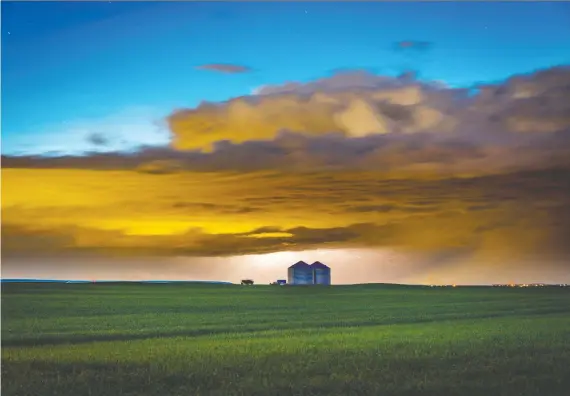  ?? MIKE DREW ?? Despite Environmen­t Canada calling this an unremarkab­le year for weather, storms have battered Calgary and region with more hail, rain, lightning and tornado warnings.