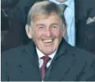  ?? ?? Schadenfre­ude: Sir Kenny Dalglish is seen laughing as Liverpool scored their fifth