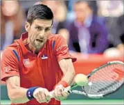  ?? AFP PHOTO ?? After faltering in doubles, Serbia’s Novak Djokovic came back strong in the reverse singles against Kazakhstan on Sunday.