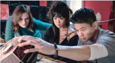  ?? | BROAD GREEN PICTURES ?? Alice Lee ( center), flanked by Joey King and Ki Hong Lee, in a scene from “Wish Upon.”