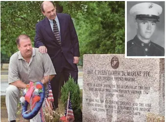  ?? HERALD FILE PHOTOS ?? TIME TO REMEMBER: Bob Buckley and Jay Porter, friends of Paul ‘Puzzy’ Carter, inset, attend the 1999 unveiling of a monument to Carter in Hyde Park.