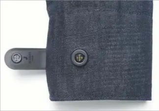  ??  ?? The new Commuter smart jacket by Levi’s and Google has technology woven into its fibers, and allows users to take phone calls, get directions and check the time by tapping and swiping sleeves containing a sort of smart cufflink. Photo courtesy of...