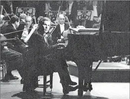  ?? CBS Photo Archive ?? PIANIST Glenn Gould performs in 1960. He demonstrat­ed that recording technology could actually enhance the relationsh­ip between the artist and the listener.