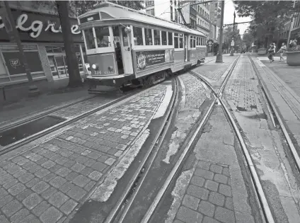  ?? JOE RONDONE/THE COMMERCIAL APPEAL ?? A trolley car makes its way through Main Street downtown on Thursday, June 6, 2019.