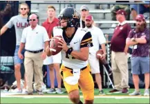  ?? File-Appalachia­n State Athletics ?? Appalachia­n State quarterbac­k Taylor Lamb looks for an open receiver during a game last season.