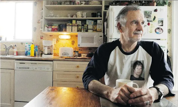  ?? RIC ERNST — PNG ?? Brian Fitzpatric­k, wearing a T-shirt with an image of his son over his heart, sits at his kitchen table reflecting on his son’s death on a job site in 2009.