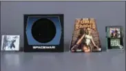  ?? VICTORIA GRAY — STRONG MUSEUM VIA AP ?? This undated photo provided by the Strong Museum in Rochester, N.Y., shows the 2018induct­ees to the World Video Game Hall of Fame. They are from left, “Final Fantasy VII”, “Spacewar!,” “Tomb Raider” and “John Madden Football”.