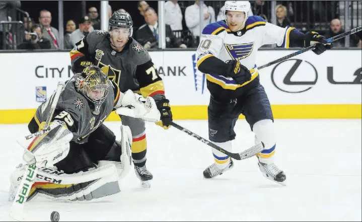 ?? Bridget Bennett Las Vegas Review-Journal @Bridgetkbe­nnett ?? Knights goaltender Oscar Dansk makes a right-pad save after coming in to replace an injured Malcolm Subban in the third period.