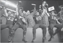  ?? MATT ROURKE/AP ?? Army players celebrate a 17-10 victory over Navy on Saturday in Philadelph­ia.