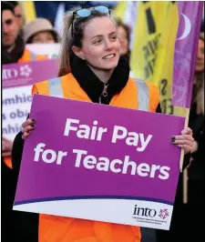  ??  ?? Teacher Nikki Good, from Our Lady Immaculate Junior School in Darndale, Dublin, at the Dáil protest. Photo: Steve Humphreys