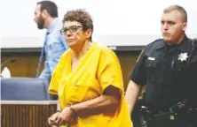  ?? STAFF FILE PHOTO ?? Janet Hinds is led into a courtroom for a preliminar­y hearing before Judge Alex McVeagh at the Hamilton County-Chattanoog­a Courts Building in 2019.
