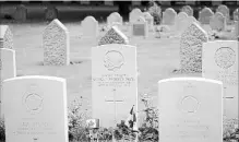  ?? VIRGINIA MAYO THE ASSOCIATED PRESS FILE PHOTO ?? The grave of Pte. George Lawrence Price, centre, at the St. Symphorien Cemetery near Mons, Belgium.