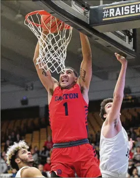  ?? DAVID JABLONSKI / STAFF ?? Dayton redshirt freshman Obi Toppin needs three dunks to beat Chris Wright’s singleseas­on program record of 66.