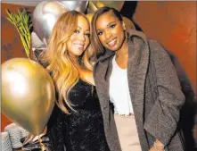  ?? Global Media Group ?? Mariah Carey, with Jennifer Hudson, at Tao Nightclub on Wednesday after winning the Icon Award at the Billboard Music Awards at
The Venetian. Hudson presented the award.