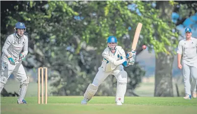  ??  ?? On the ball: Andrew Maclaren hits out for Stoneywood-Dyce against Falkland