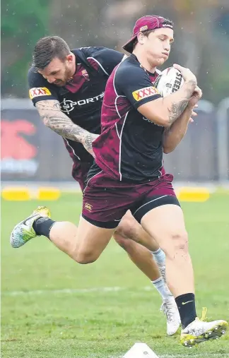  ?? Picture: GETTY IMAGES ?? Jarrod Wallace trains with the Maroons at Sanctuary Cove yesterday. EMMA GREENWOOD
