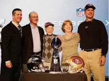  ?? Matt Slocum/Associated Press ?? Jim Harbaugh, right, and John Harbaugh, left, pose with their parents, Jack and Jackie, and grandfathe­r Joe Cipiti in 2013.