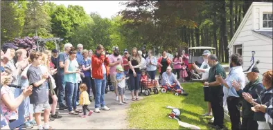  ?? Deborah Rose / Hearst Connecticu­t Media ?? Harrybrook­e Park in New Milford celebrated the return of the peacocks at a special welcome home party on Sunday. New Milford Mayor Pete Bass announces May 19 as Peacock Day.