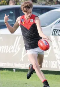  ?? PHOTO: Karen Baum. ?? Fraser Phillips drives Warragul Under 16s into attack from near the boundary line at Wonthaggi as the young Gulls made it five wins from six games: