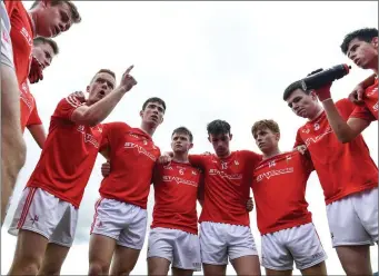  ??  ?? Louth captain James O’Reilly motivates his team ahead of the All-Ireland Minor quarter-final but is left dejected at the final whistle (below).