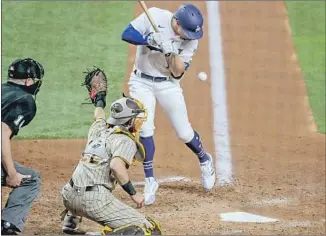  ?? Robert Gauthier Los Angeles Times ?? DODGERS left f ielder Kiké Hernandez, who was hit by a pitch in Game 1 of the NLDS at Globe Life Field in Arlington, Texas, was among those who got to hear their usual walk- up song.