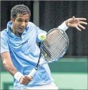  ??  ?? India's Ramkumar Ramanathan returns to Canada's Schnur during a Davis Cup tennis match in Edmonton