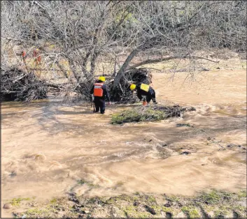  ?? San Luis Obispo County Sheriff ’s Office ?? Rescuers resume their search Wednesday for 5-year-old Kyle Doan, who was swept away Monday by floodwater­s near San Miguel, Calif.