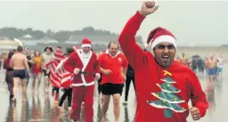  ??  ?? More than 900 hardy souls took part in the Porthcawl Christmas Morning Swim last year