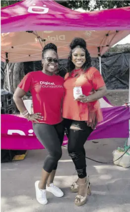  ?? ?? Reshima Kelly Williams (left), brand marketing manager - Digicel and Khadine “Miss Kitty” Hylton, Digicel brand ambassador enjoy a moment at the blood drive.
