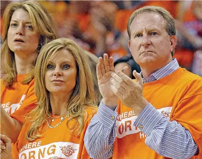  ??  ?? Jump through hoops: Sarver, with wife Penny, could win over fans by jetting in to talk about his bid