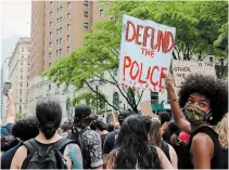  ?? RAGAN CLARK
THE ASSOCIATED PRESS ?? Protesters march in New York on June 6. The push to defund police isn’t well-received among key Democrats.