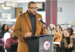  ?? ?? Gary Mayor Eddie Melton addresses a representa­tive of Calumet College of St. Joseph during Thursday’s public hearing.