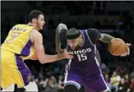  ?? JAE C. HONG — THE ASSOCIATED PRESS FILE ?? DeMarcus Cousins, right, drives past Los Angeles Lakers’ Larry Nance Jr. during the second half of an NBA basketball game in Los Angeles. The Sacramento Kings traded Cousins and Omri Casspi to the New Orleans Pelicans in exchange for Tyreke Evans, 2016...