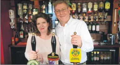  ??  ?? Julian and Wendy Fisher, new landlady and landlord at The Queen’s Head in Kingsnorth